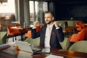 Business owner celebrating successful merger deal completion