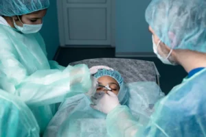 Surgical team during procedure – medical practice consolidation concept