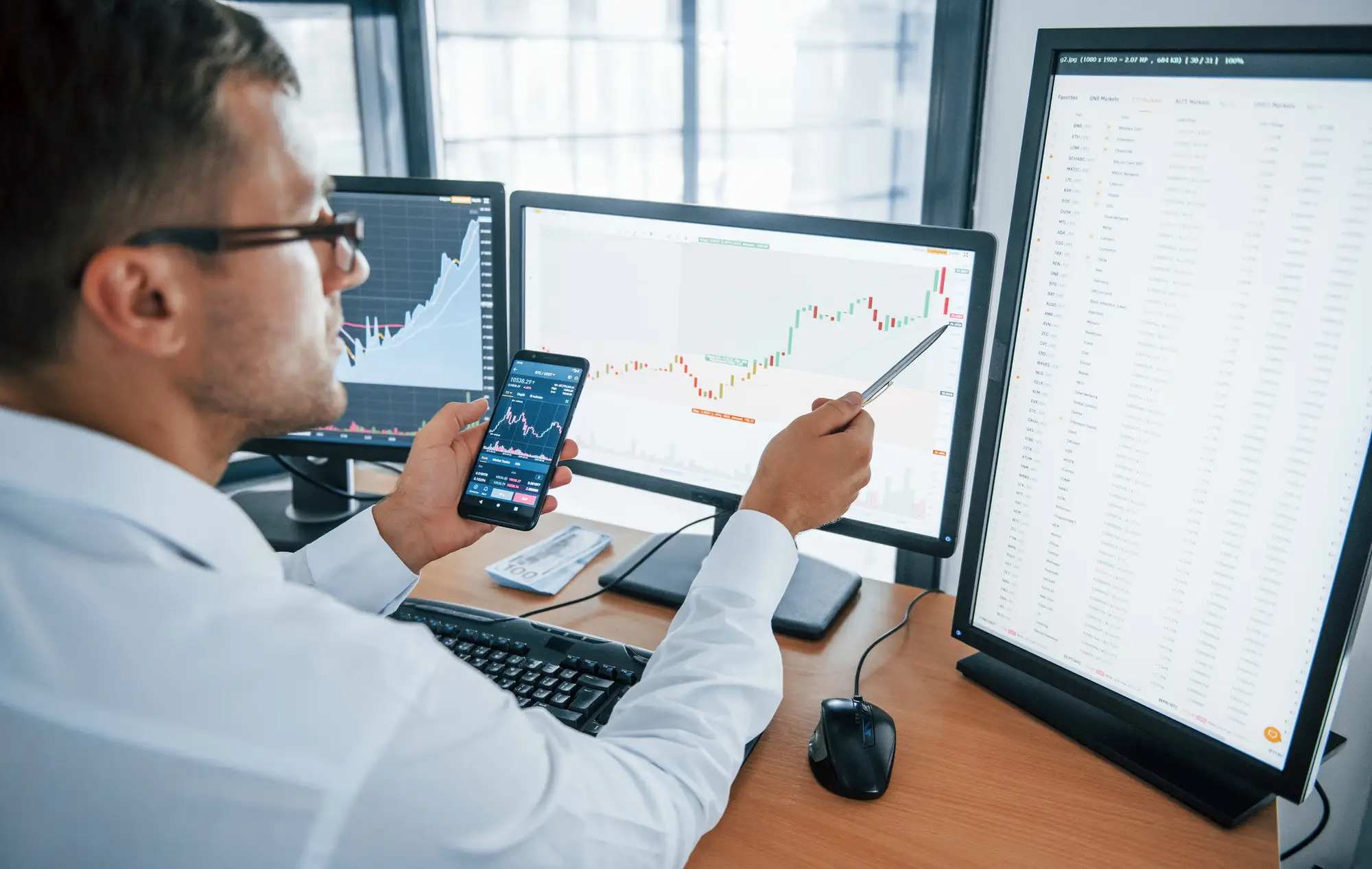 M&A advisors reviewing company valuation report with clients